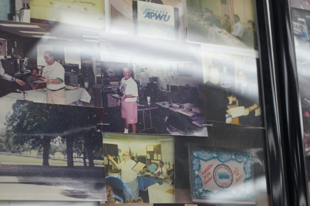 Old photographs of the Philadelphia BMC Local 7048 members on wall in union office